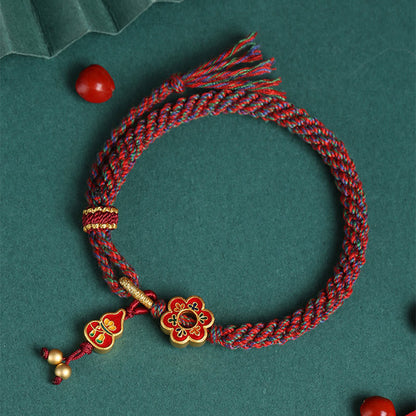 Pulsera trenzada de protección con flores de calabaza de colores hecha a mano de Mythstone