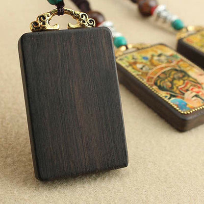 Colgante de collar de ébano con la paz y el dios de la riqueza del Thangka del Tíbet de Mythstone 