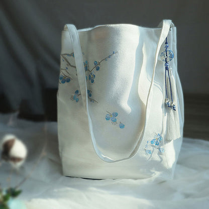 Bolso de mano de lona de gran capacidad con bordado de flores de ciruelo y grulla de Mythstone