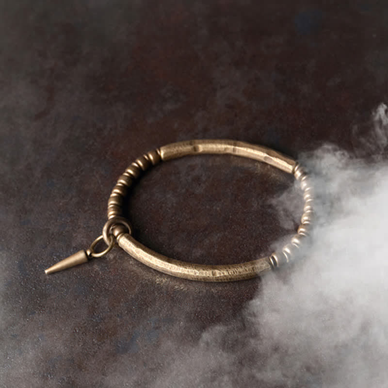 Brazalete brazalete de equilibrio de cobre con piedra de lava Mythstone