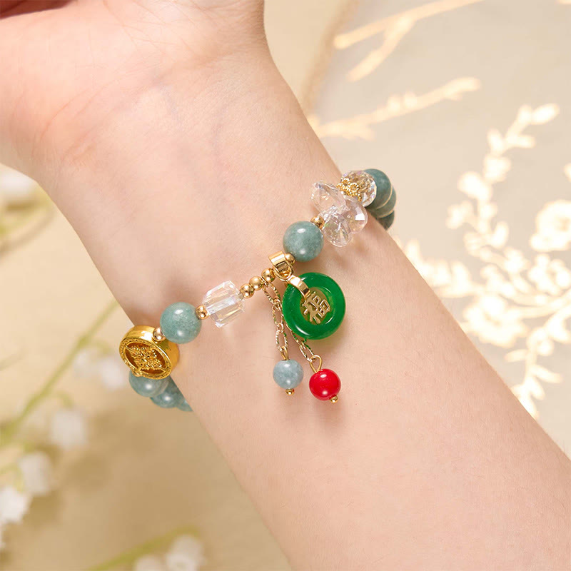 Pulsera curativa con dijes de personaje de jade y cuarzo fresa Mythstone 