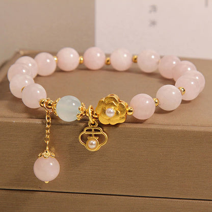 Pulsera de la suerte con flor de cristal rosa natural Mythstone