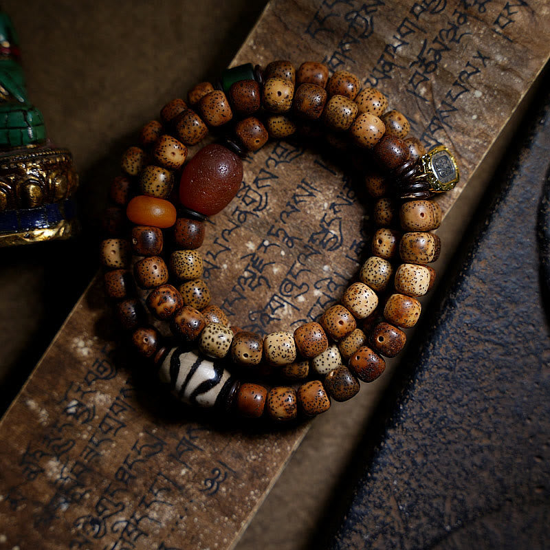 Pulsera de triple vuelta con cuentas de ámbar, dzi, semilla de Bodhi tibetano, ágata y zakiram, diosa de la riqueza