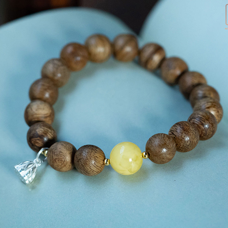 Mythstone Tarakan Agarwood Amber Red Agate Laughing Buddha Strength Meditation Bracelet