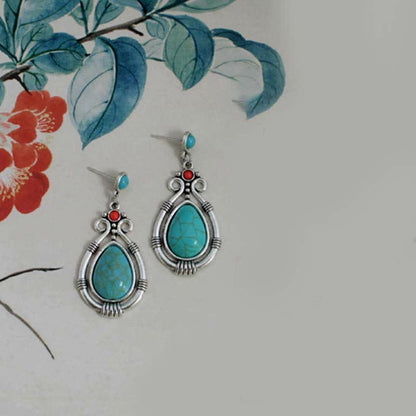 Pendientes colgantes con clip y diseño de gota de agua de turquesa vintage del Tíbet de Mythstone