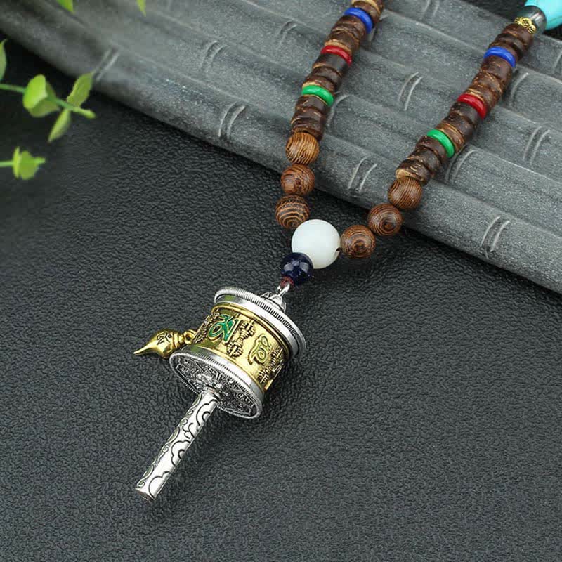 Collar con colgante de madera Vajra con rueda de oración tibetana Om Mani Padme Hum de Mythstone