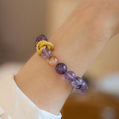 Pulsera de la sabiduría del dragón bañada en oro y cobre fantasma morado Mythstone