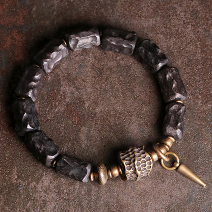 Pulsera de pareja con protección del equilibrio de cobre y madera de ébano Mythstone