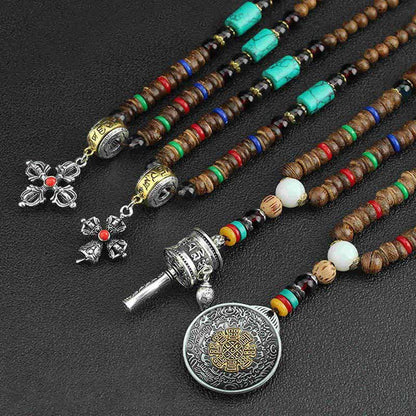 Collar con colgante de madera Vajra con rueda de oración tibetana Om Mani Padme Hum de Mythstone