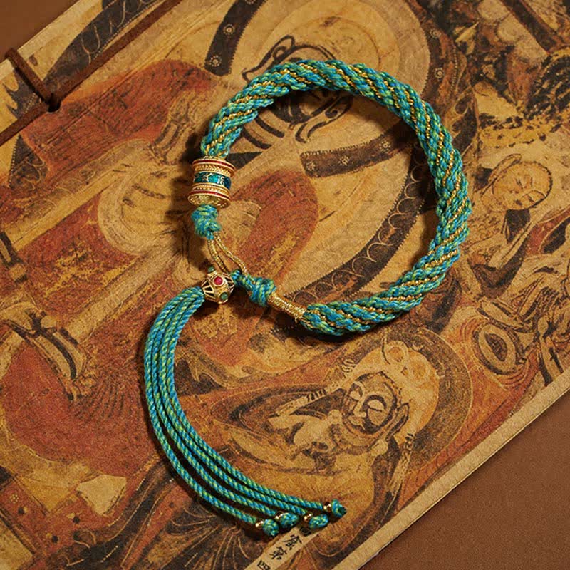 Pulsera de hilo tejido con amuleto de la suerte Thangka tibetano Mythstone hecha a mano