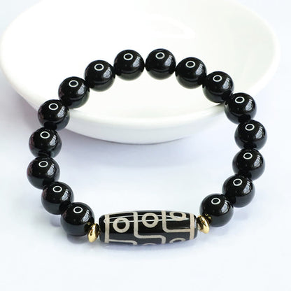 Pulsera de poder de ónix negro con cuentas tibetanas Dzi de nueve ojos Mythstone