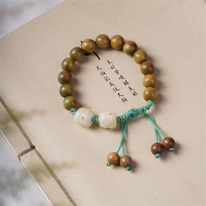 Pulsera positiva con semillas de Bodhi y sándalo verde Mythstone y gato de la suerte