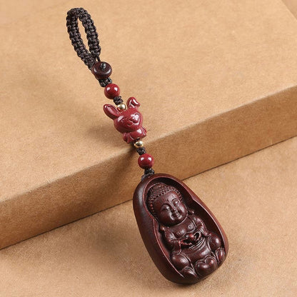 Llavero con amuleto de protección del zodíaco chino con forma de Buda de cinabrio y sándalo rojo y hoja pequeña de piedra mitológica