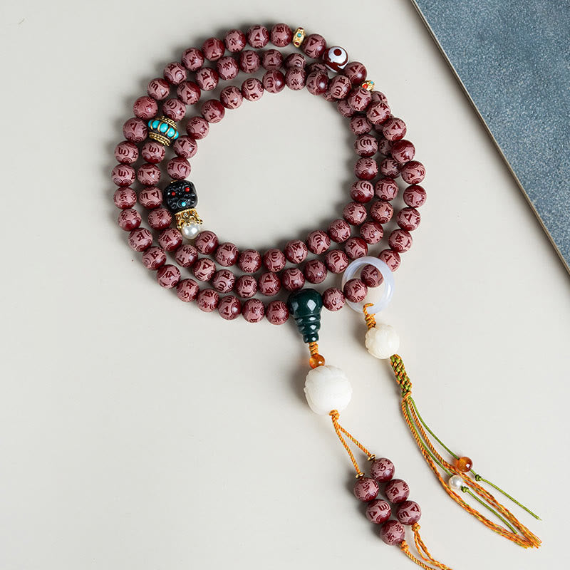 Pulsera de armonía grabada con semilla de bodhi roja de Mythstone Om Mani Padme Hum Lotus 