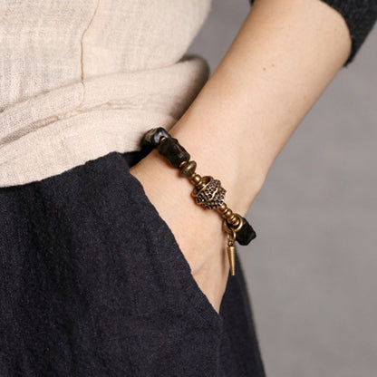 Pulsera de pareja con protección del equilibrio de cobre y madera de ébano Mythstone