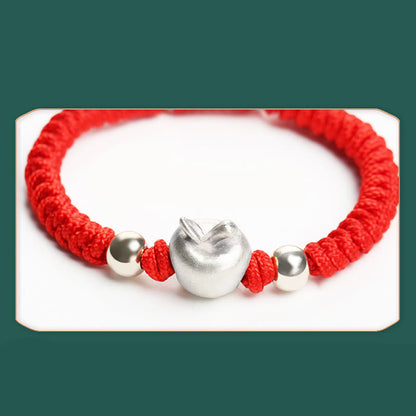 Pulsera para niños hecha a mano con cuerda multicolor de manzana roja de plata esterlina 999 de Mythstone