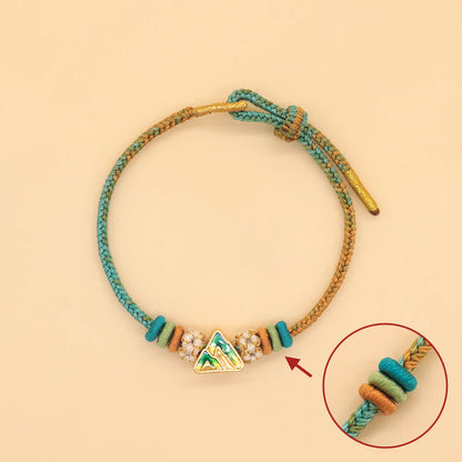 Pulsera trenzada de cuerda de la suerte con nudo de la paz y flor de durazno de ocho hilos hecha a mano de Mythstone 