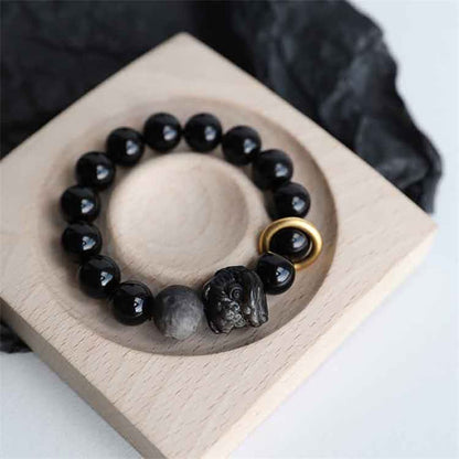 Pulsera de fuerza con león de obsidiana plateada y brillo de obsidiana negra Mythstone