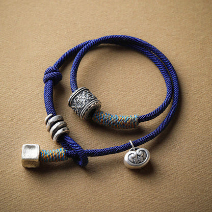 Pulsera de cuerda de doble vuelta con amuleto auspicioso tallado Om Mani Padme Hum tibetano hecho a mano de Mythstone