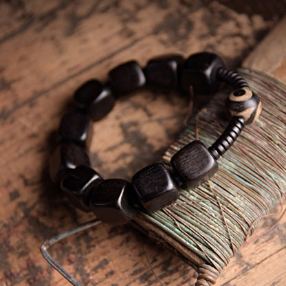 Mythstone Tibetan Ebony Wood Dzi Bead Strength Bracelet