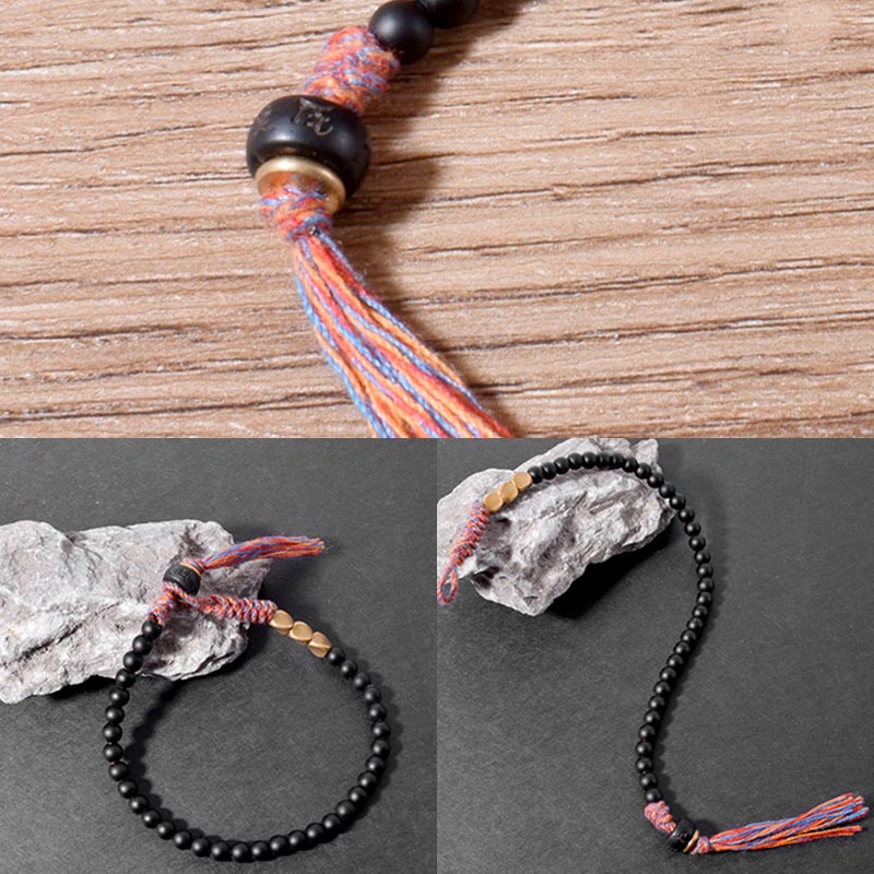 Pulsera de borlas de ónix negro tibetano hecha a mano Mythstone 