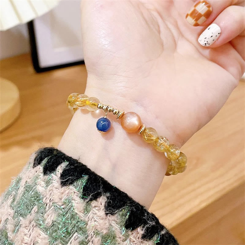 Pulsera de riqueza de cianita con piedra solar y cuarzo rutilado y oro natural Mythstone 