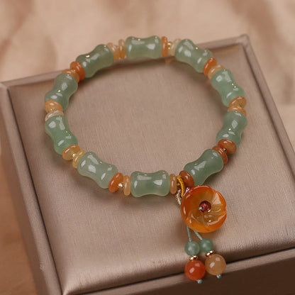 Pulsera de la suerte con diseño de flor de bambú y jade natural de Mythstone