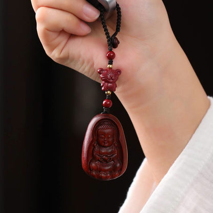 Llavero con amuleto de protección del zodíaco chino con forma de Buda de cinabrio y sándalo rojo y hoja pequeña de piedra mitológica