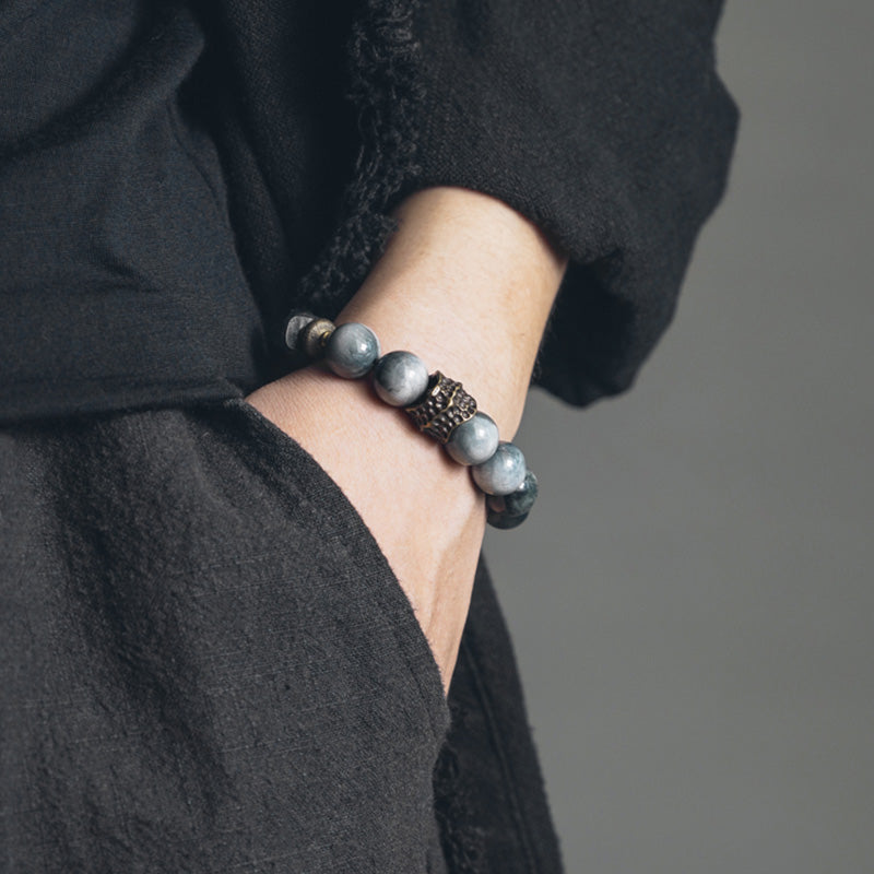 Pulsera de pareja de cobre, madera de ébano y piedra de ojo de águila de MythStone