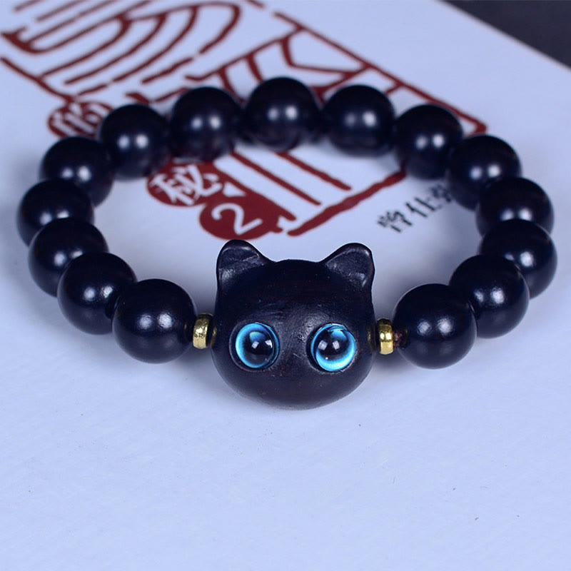 Pulsera de equilibrio de paz con forma de gato encantador de madera de ébano y cristal de Liuli Mythstone 