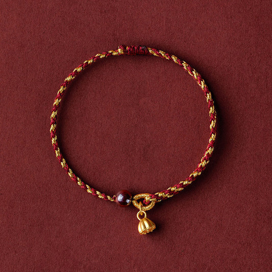 Pulsera trenzada con dije de paz y alegría de loto hecha a mano con cuerda de oro rojo de Mythstone 