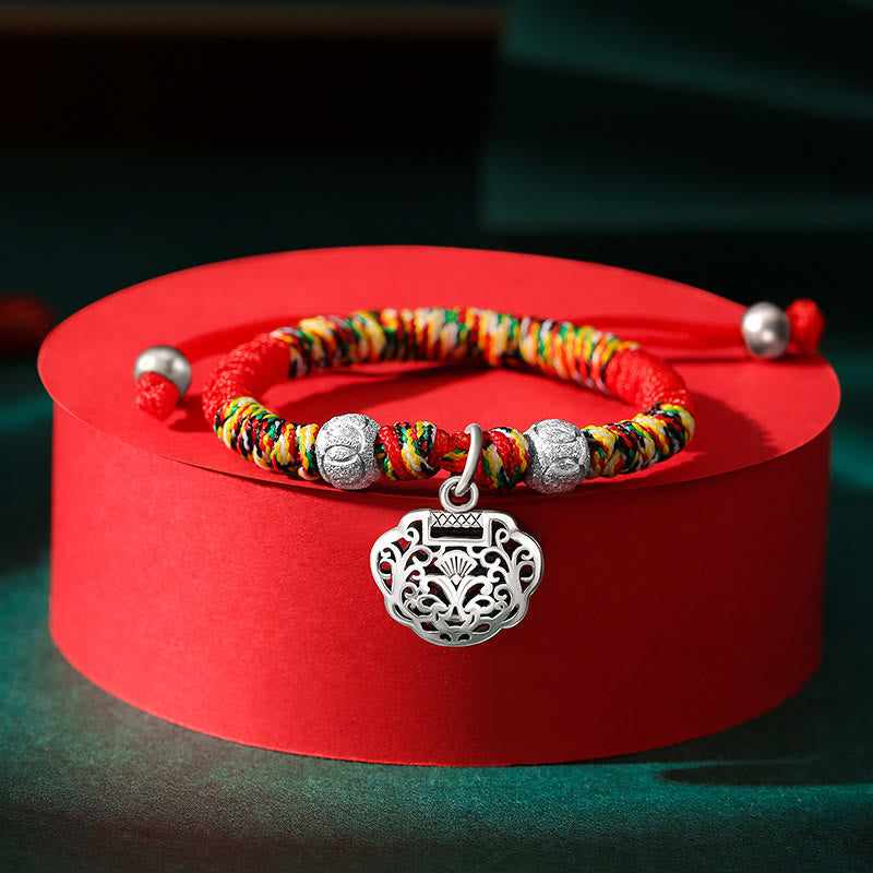 Pulsera trenzada hecha a mano para niños con dije de candado chino en plata de ley 925 de Mythstone con hilo rojo multicolor