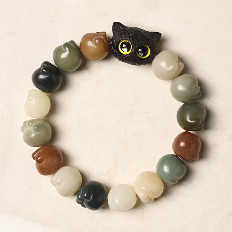 Pulsera de la suerte con forma de gato de la sabiduría y semillas de Bodhi naturales de Mythstone con forma de pata encantadora de madera de ébano 