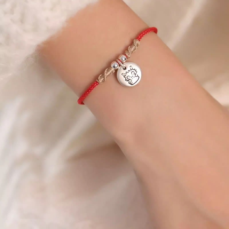 Pulsera trenzada con el signo de la suerte del año del dragón chino hecha a mano en plata de ley 999 de Mythstone 