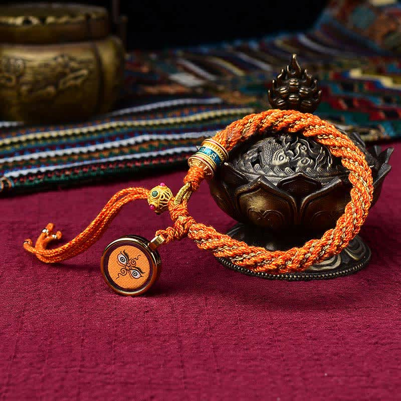 Pulsera de hilo tejido con amuleto de la suerte Thangka tibetano Mythstone hecha a mano