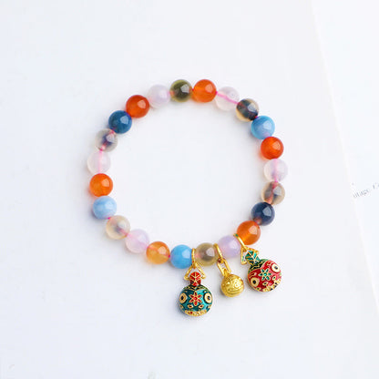 Pulsera con dijes de armonía de melocotón y familia de bestias devoradoras de oro y ágata de caramelo de colores Mythstone