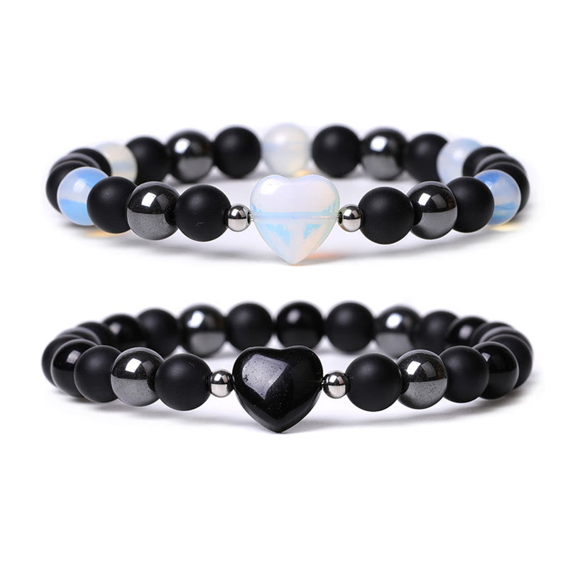 Pulsera de protección con corazón de amor y cristal de ojo de tigre y ónix negro Mythstone 