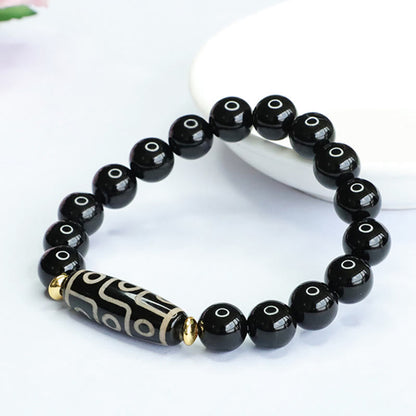 Pulsera de poder de ónix negro con cuentas tibetanas Dzi de nueve ojos Mythstone