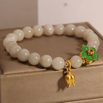 Pulsera de la suerte con lirio de los valles y flor de jade verde natural Mythstone 