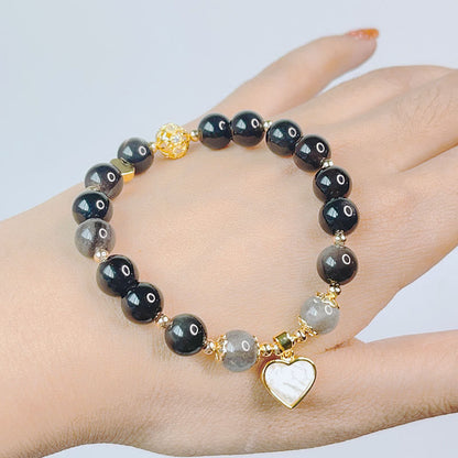 Pulsera de protección con forma de corazón, estrella y flor de obsidiana con brillo de plata natural Mythstone