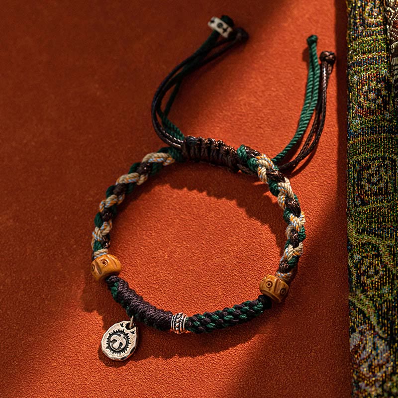 Pulsera de cuerda de la riqueza con cuentas tibetanas Dzi y hueso de yak de ágata