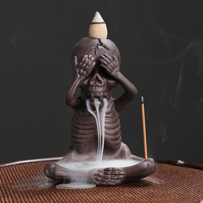 Quemador de incienso de arcilla morada con forma de calavera fantasma de Mythstone, fuente de humo con reflujo, decoración de la paz