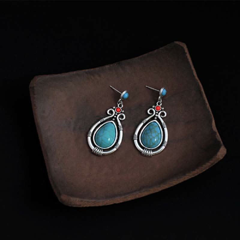 Pendientes colgantes con clip y diseño de gota de agua de turquesa vintage del Tíbet de Mythstone