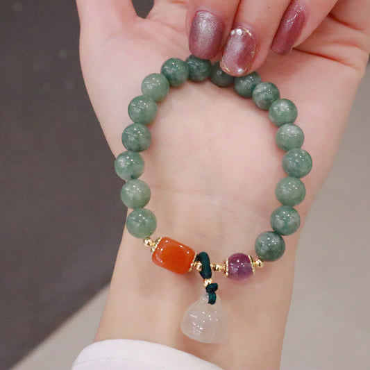 Pulsera curativa de cristal de amatista con hebilla de paz y loto de jade cian y calabaza Mythstone