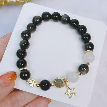 Pulsera de protección con forma de corazón, estrella y flor de obsidiana con brillo de plata natural Mythstone