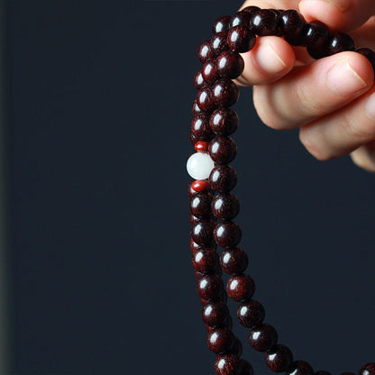 Pulsera de equilibrio tibetano con mala de loto y sándalo rojo y hojas pequeñas de MythStone 