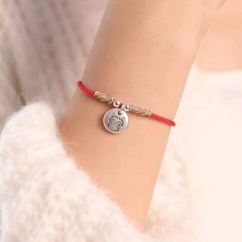 Pulsera trenzada con el signo de la suerte del año del dragón chino hecha a mano en plata de ley 999 de Mythstone 