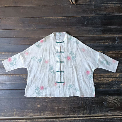 Camisa de lino con ramio y manga larga con botones de rana y flores blancas y rojas de Mythstone