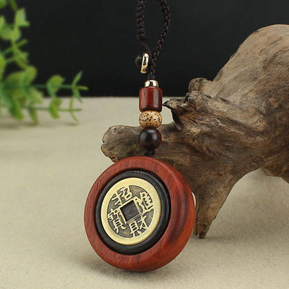 Llavero de madera de ébano y sándalo rojo con moneda de cobre Mythstone que atrae la riqueza 