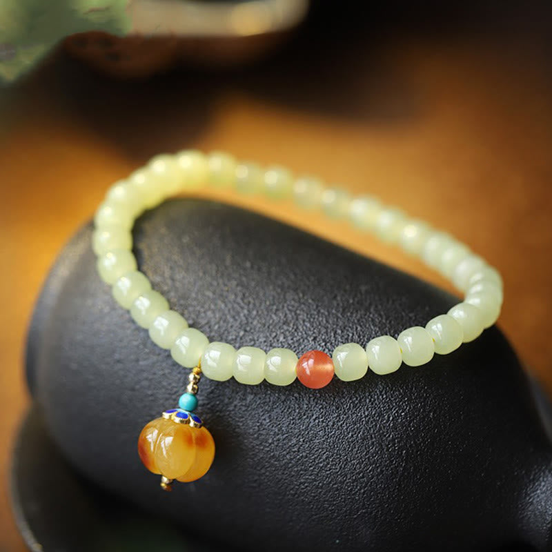 Pulsera de prosperidad con cristal de ágata roja, ámbar y calabaza de jade hetiano natural